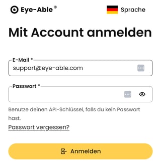 Login-Seite des Eye-Able Dashboards mit Überschrift „Mit Account anmelden“ und Sprachumschaltung „Sprache“. Formular mit Pflichtfeldern „E‑Mail *“ (ausgefüllt mit „support@eye-able.com“) und „Passwort *“ mit Icon zum Anzeigen/Verbergen sowie Hinweis „Benutze deinen API‑Schlüssel, falls du kein Passwort hast.“ Darunter Link „Passwort vergessen?“ und primärer Button „Anmelden“.